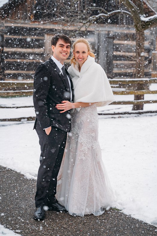 bride and groom in snow